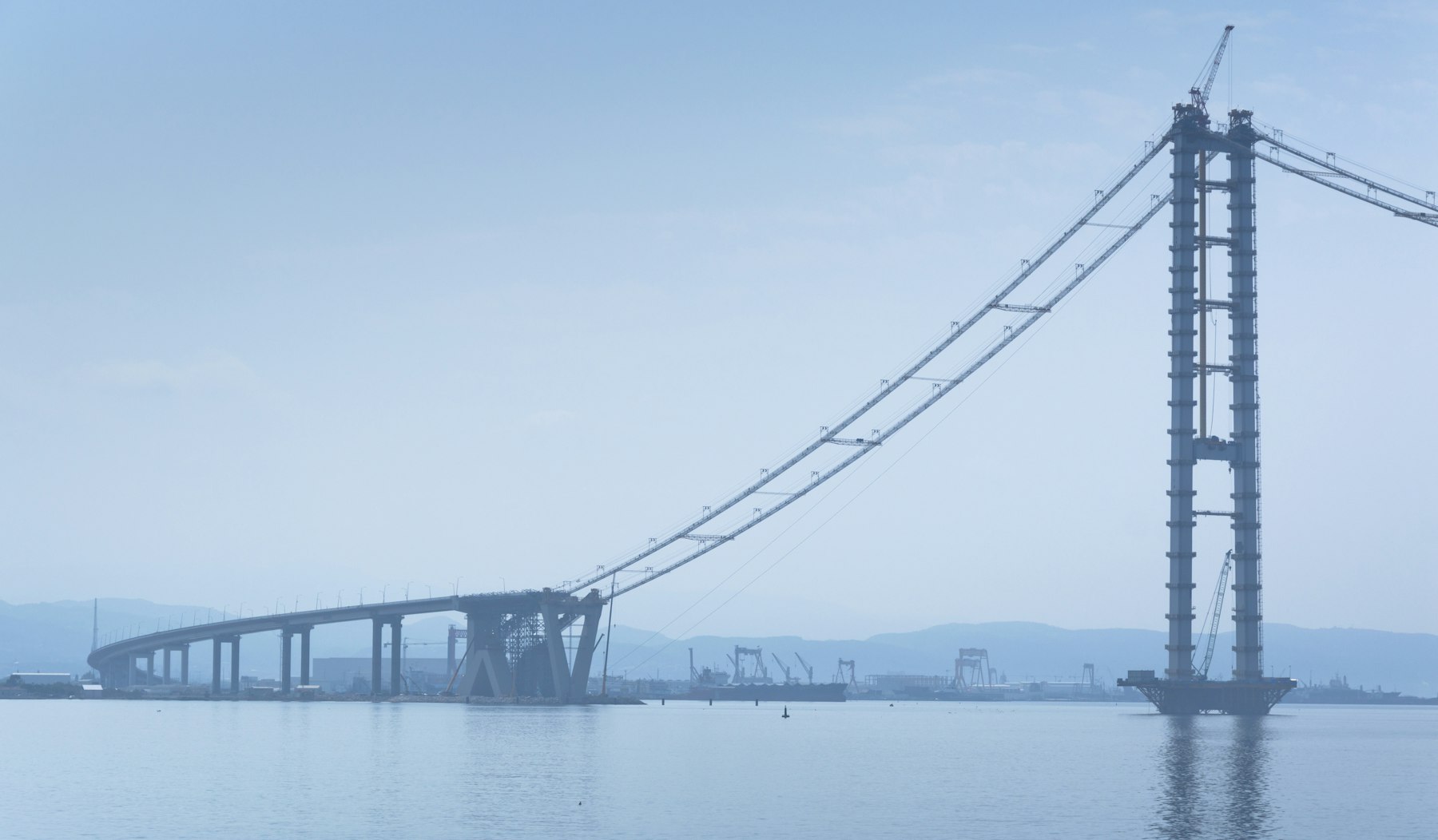 Bridge construction over water illustrating bridge engineering